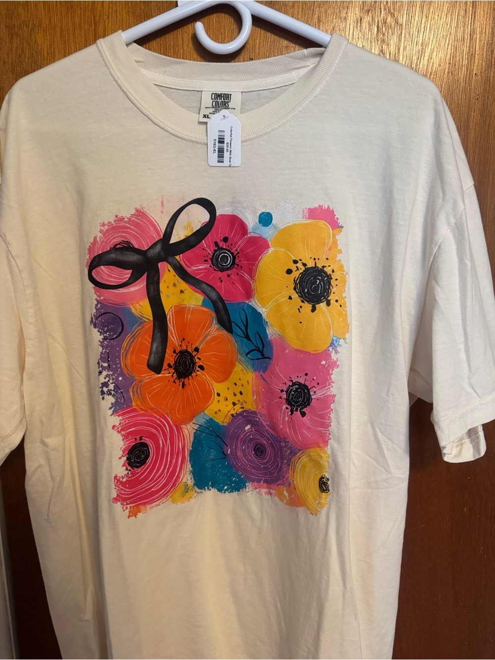 Comfort Colors Cream Short Sleeve Tee with Colorful Floral Bow Graphic